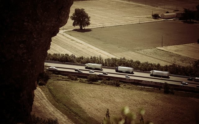 Commercial trucks on a highway